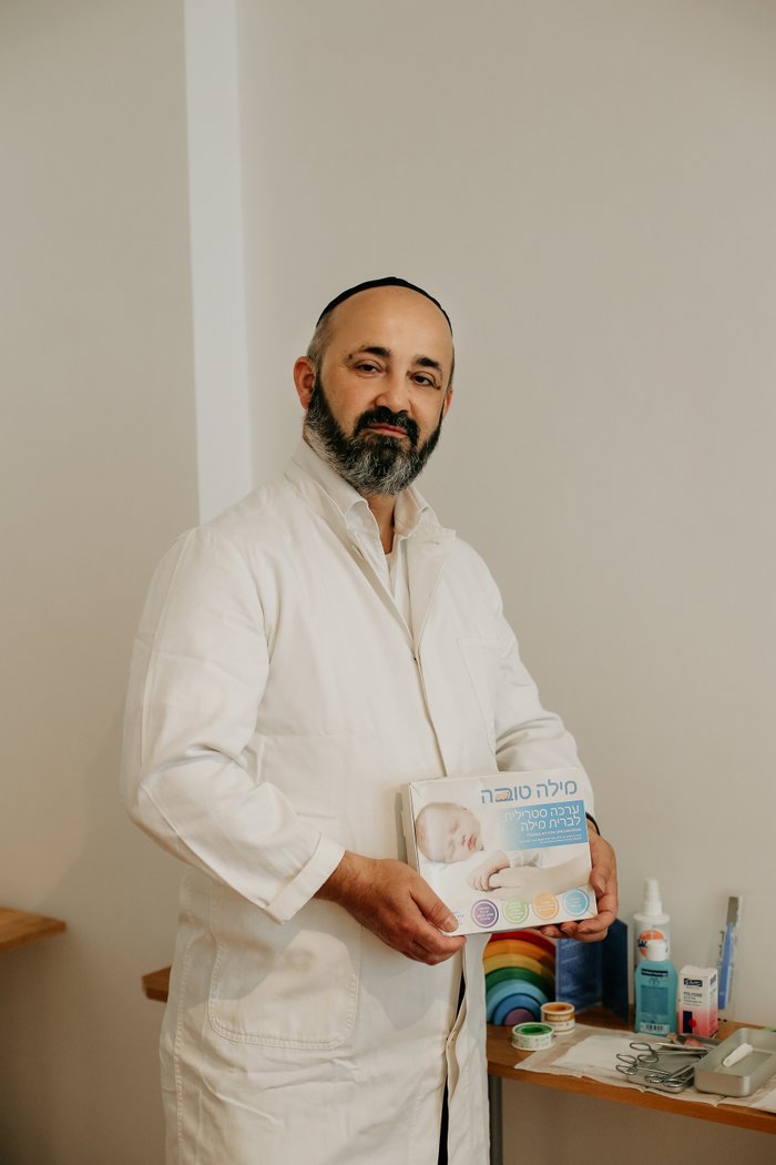 Certified mohel Rabbi Reuven Yaacobov with family after brit milah